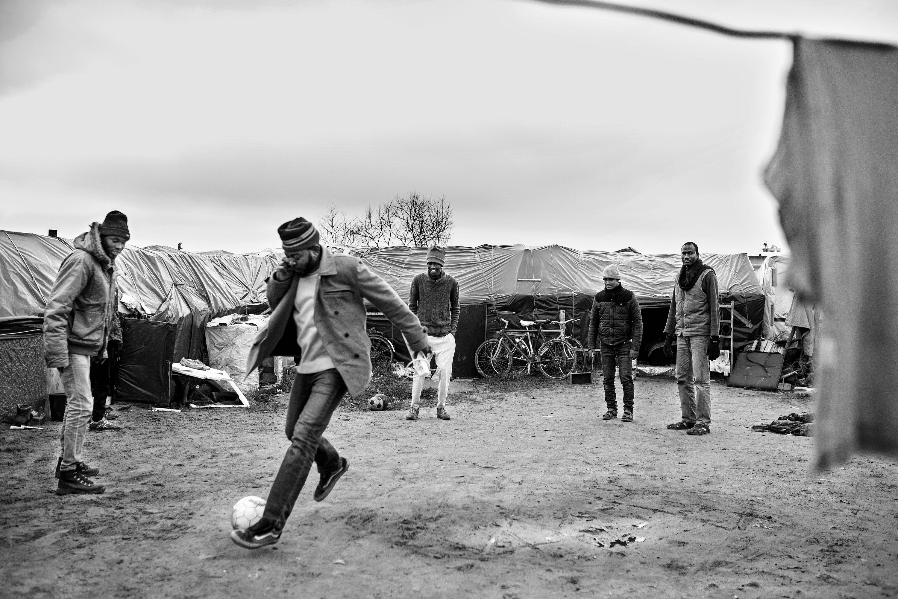 Playing football at the camp.
