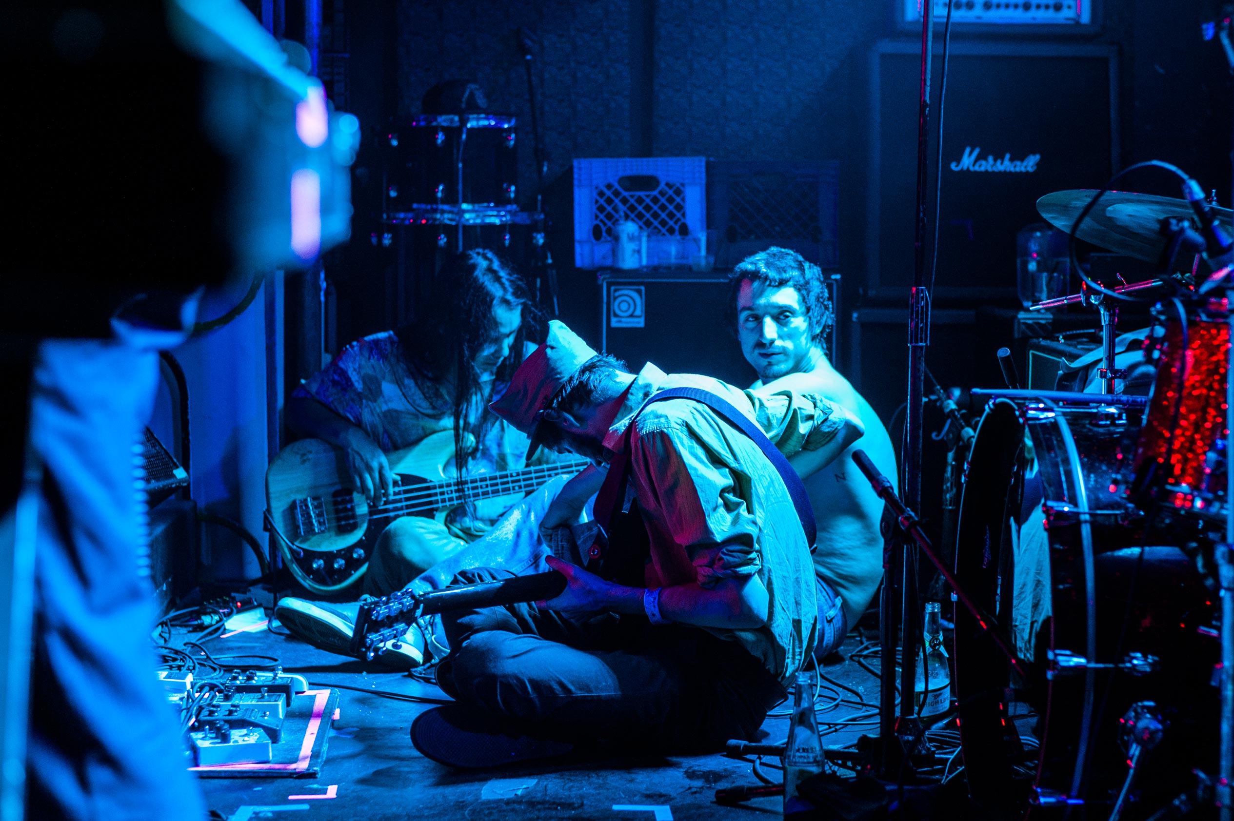 Taishi, Adam and Lias rest during a slow part of a song at Baby’s All Right.