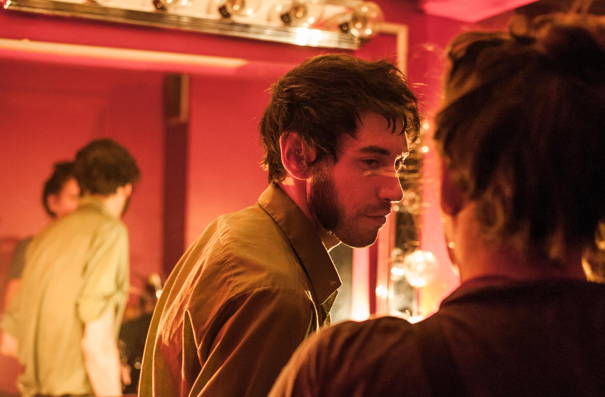Guitarist Adam Harmer relaxing backstage after the Le Poisson Rouge show.
