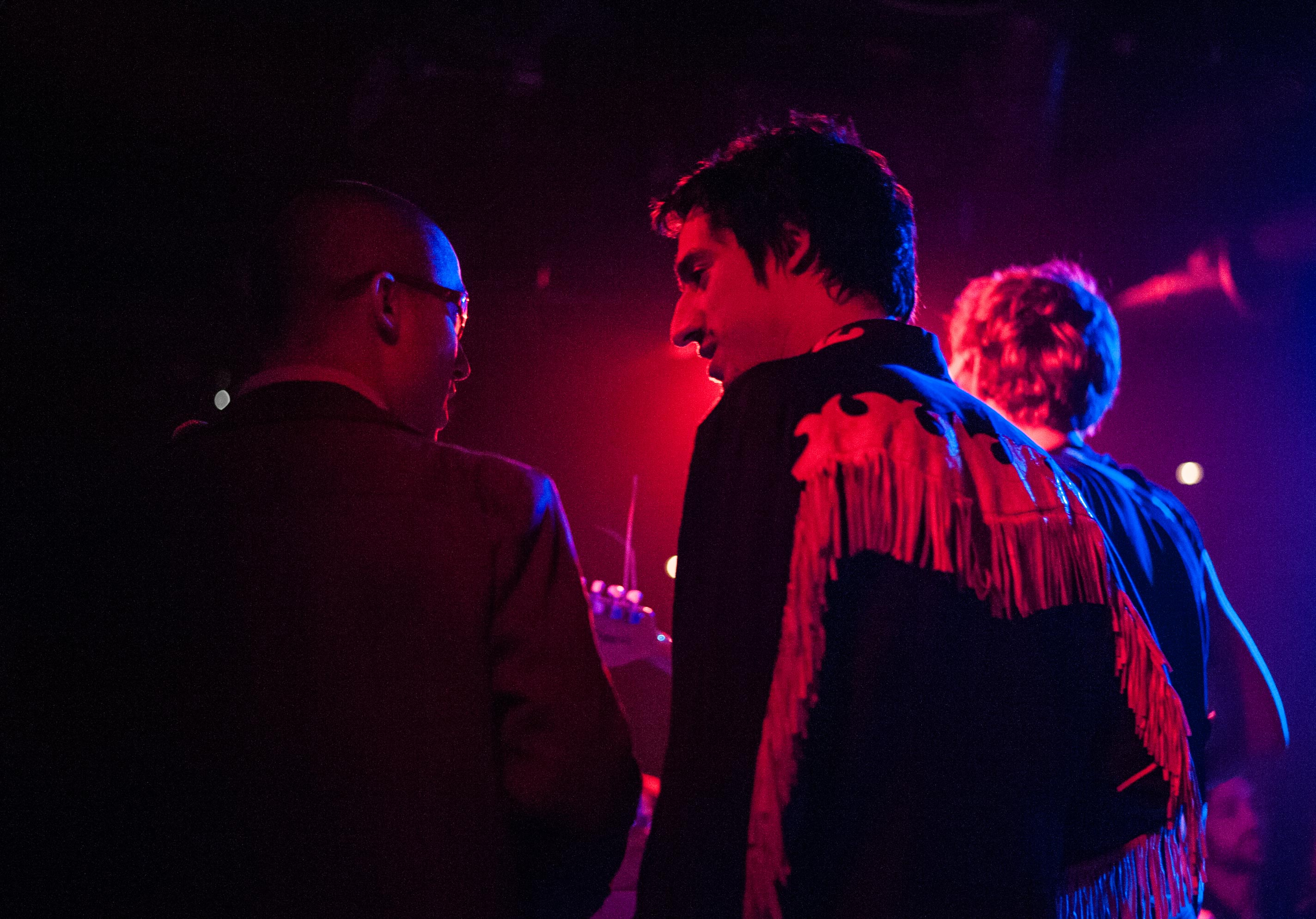 Brothers Lias and Nathan Saoudi (keyboards) walk onstage at U Street Music Hall.