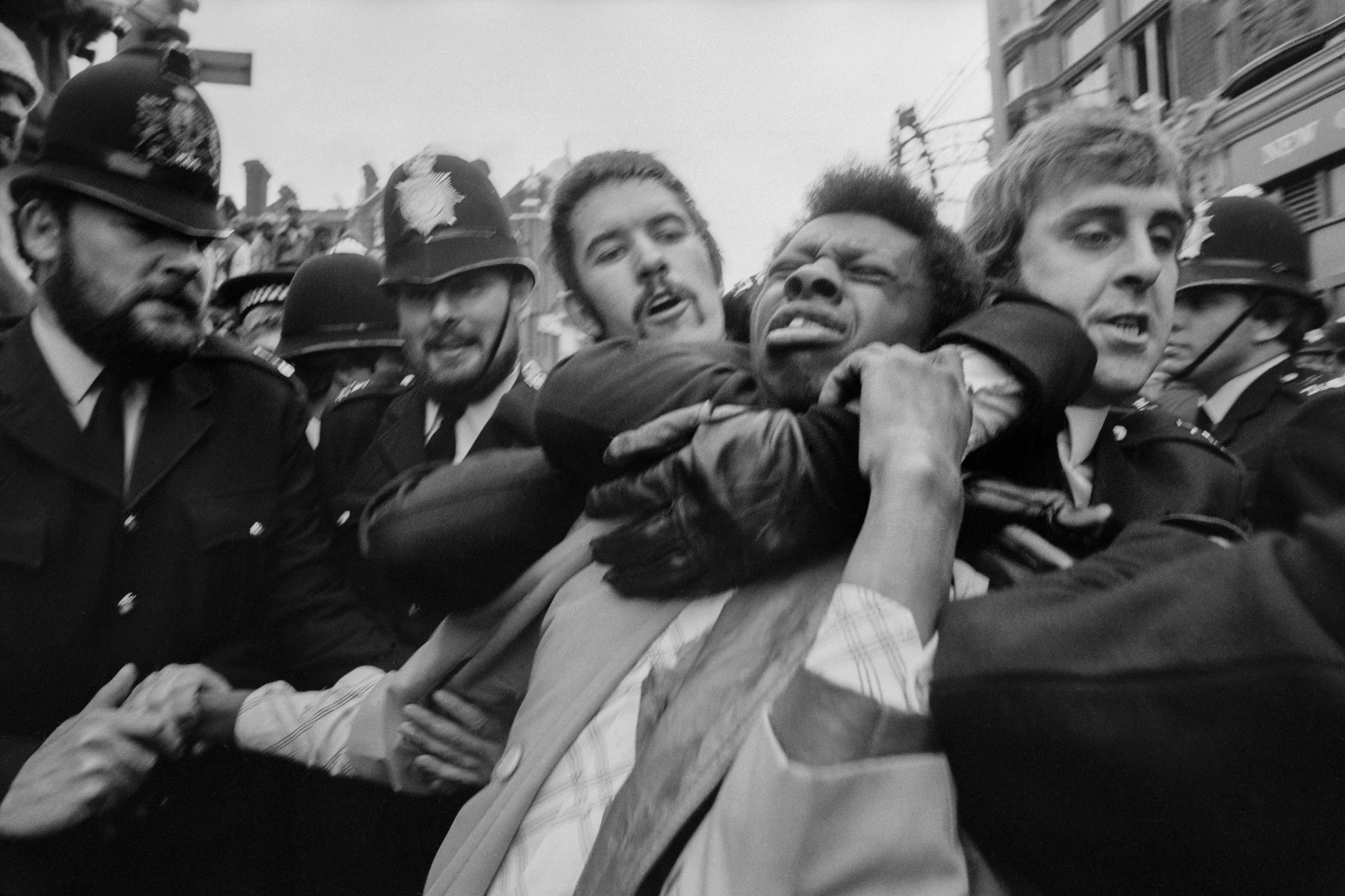 GB. ENGLAND. London. Race Riots in Lewisham. Police making an arrest. 1977.