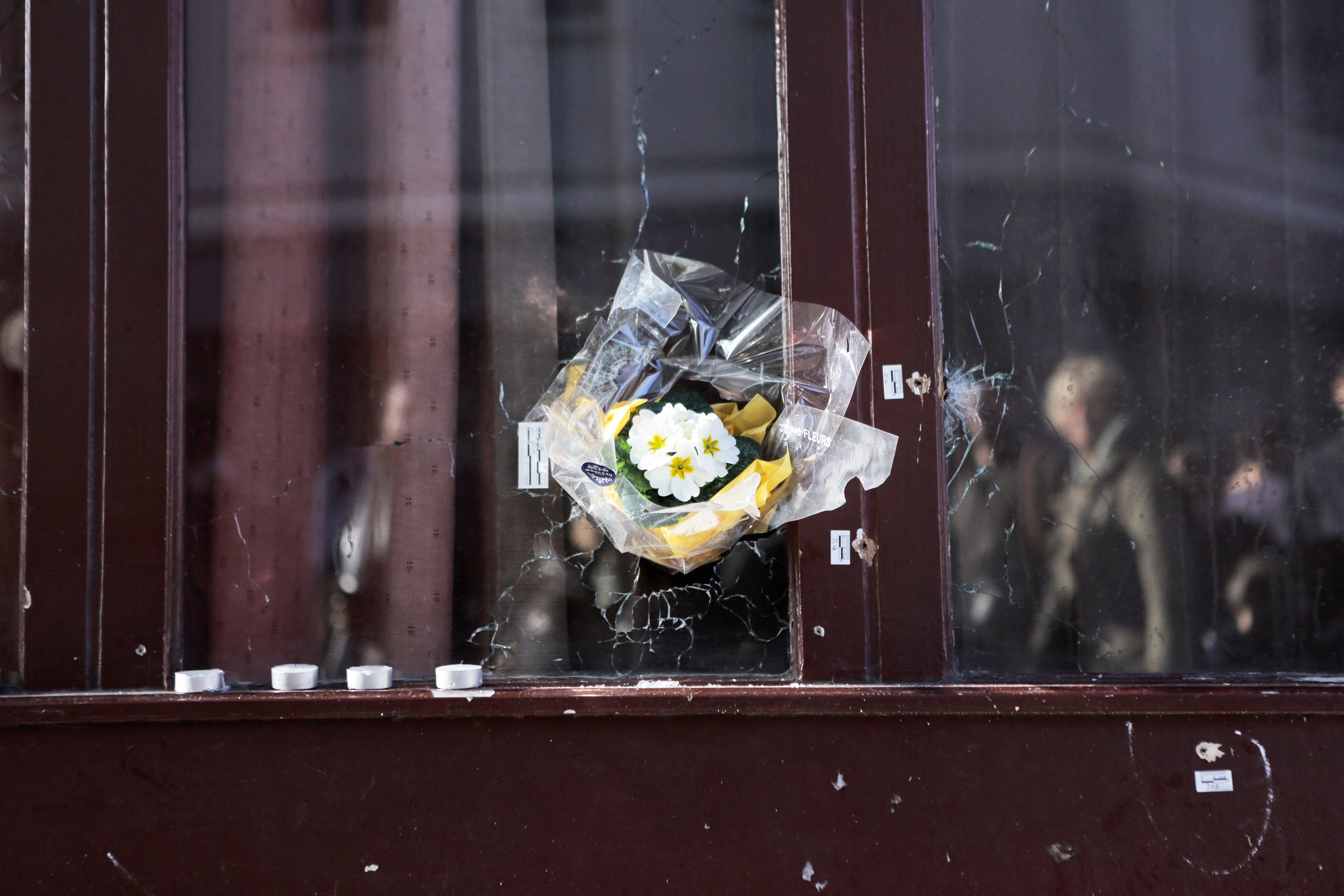 Flowers left in commemoration of those who died in the terrorist attacks on Paris, November 2015. Photo by Daniella Zalcman.
