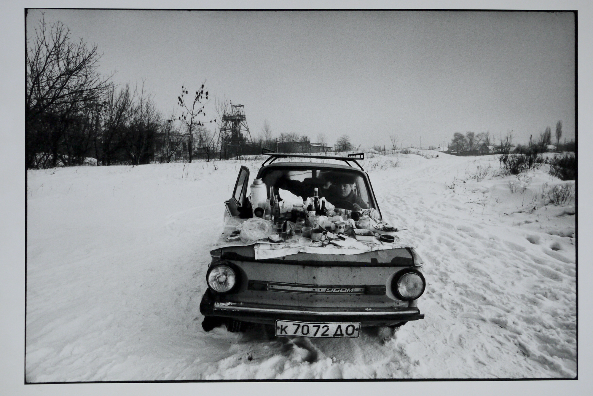 A family tries to keep warm in their car on New Year's Day, 1992. The temperature was -15C.