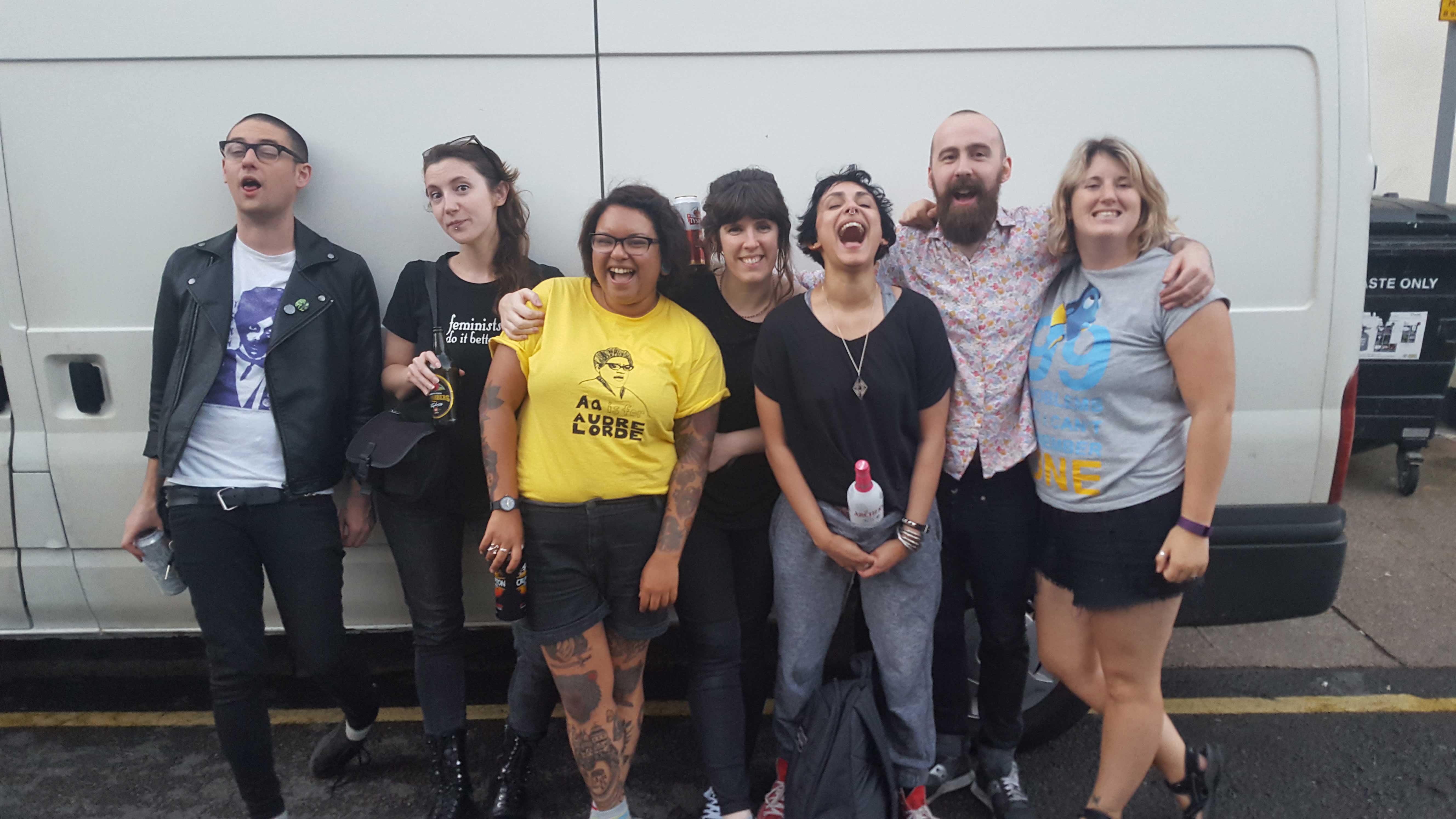 Little Fists and Fight Rosa Fight! on tour with their driver JC (far left). Photo by Cassie Agbehenu.