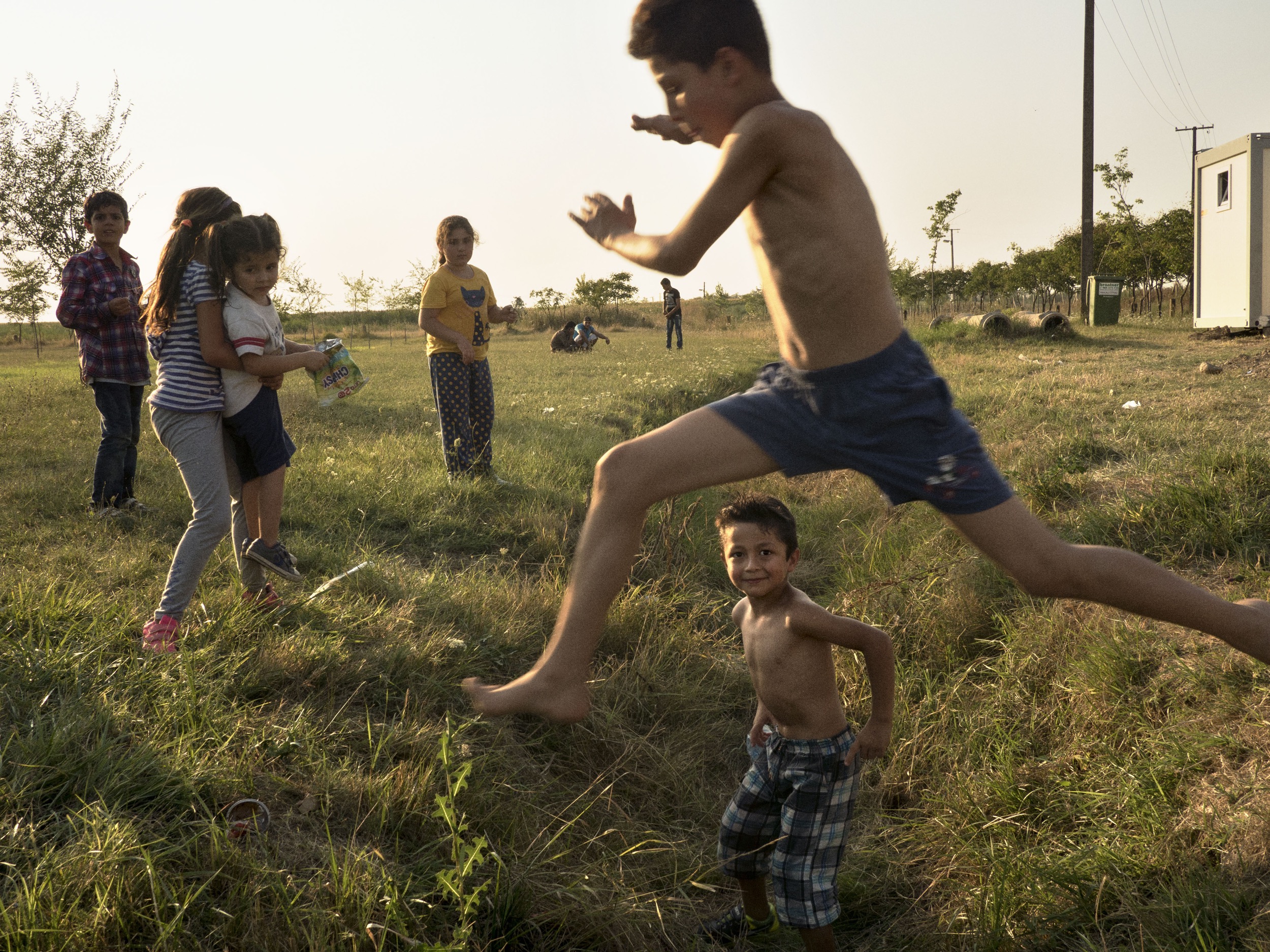 Syrian families, mostly from Aleppo, are placed in a refugee camp in Vasariste near the Serbian- Hungarian border. After a day to recover, they will walk and attempt to cross the Serbian-Hungarian get to Serbia, the last country that stands between them and a European Union member state, Hungary. SERBIA. Vasariste. August 12, 2015 © Jerome Sessini