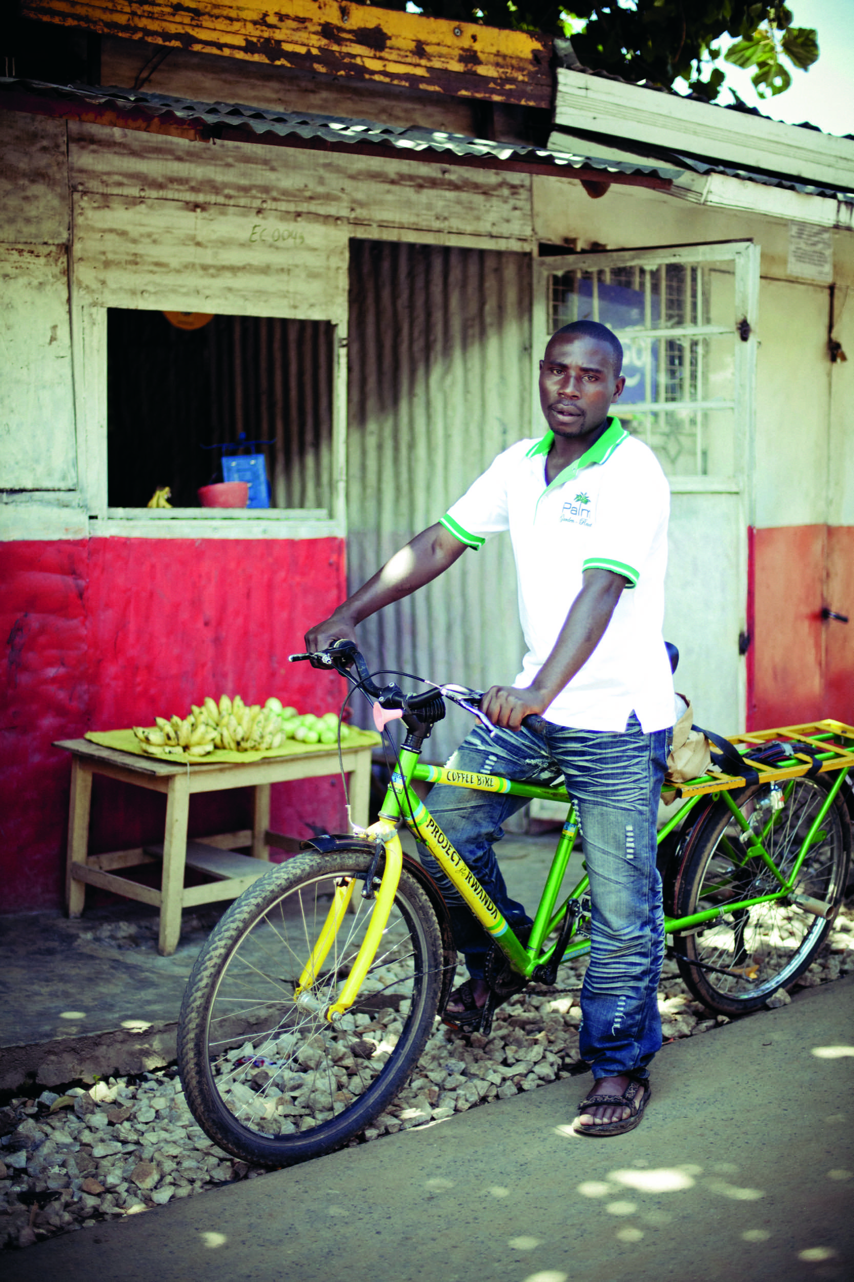 Turimumahoro John Bosco, aged 30, on a Project Rwanda Coffee bicycle