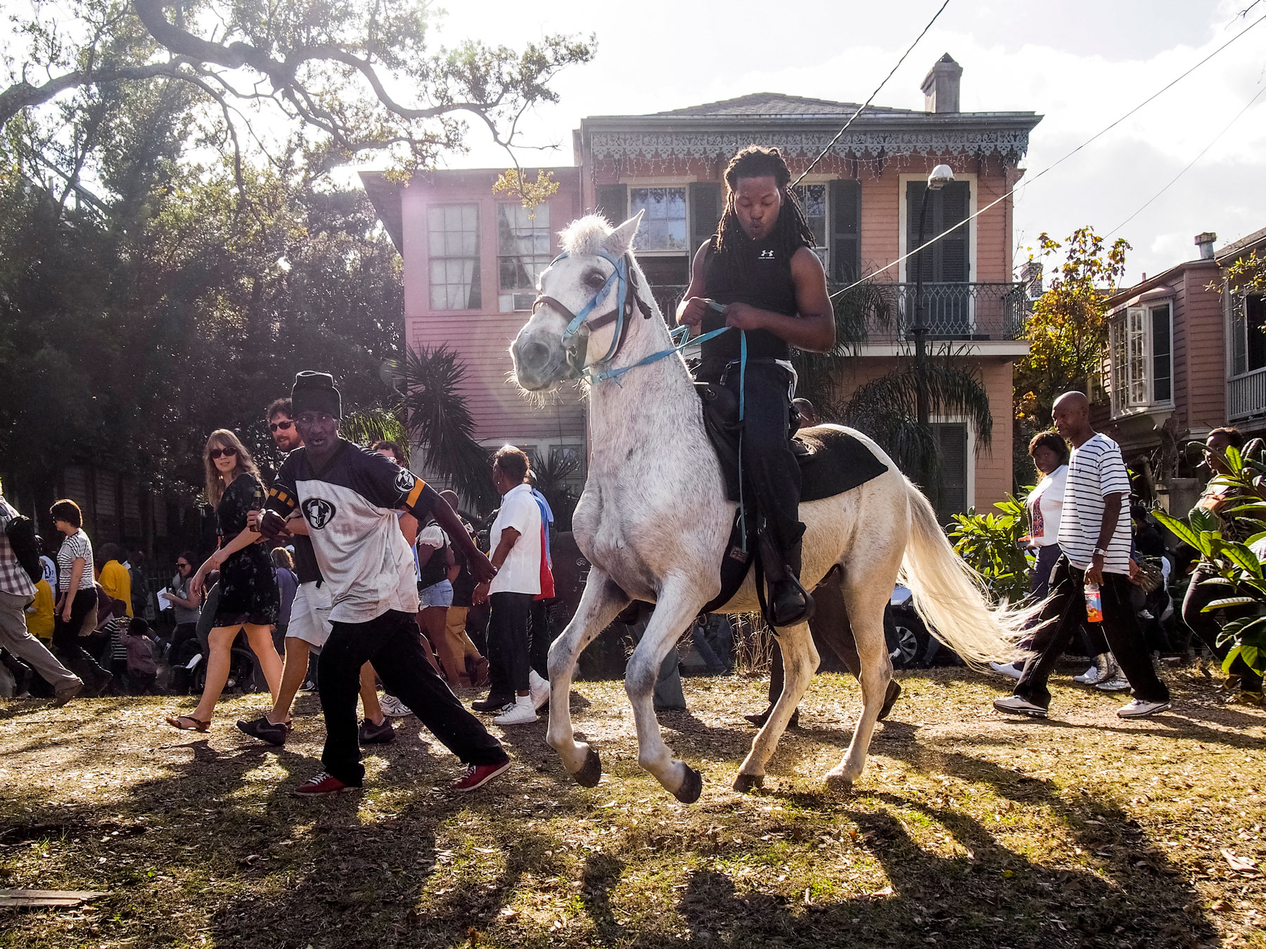 New Orleans, Louisiana. 2012. A Second Line parade: a local African American tradition where brass bands — known as the first line — march in the streets and are joined by members of the public — called the second liners.