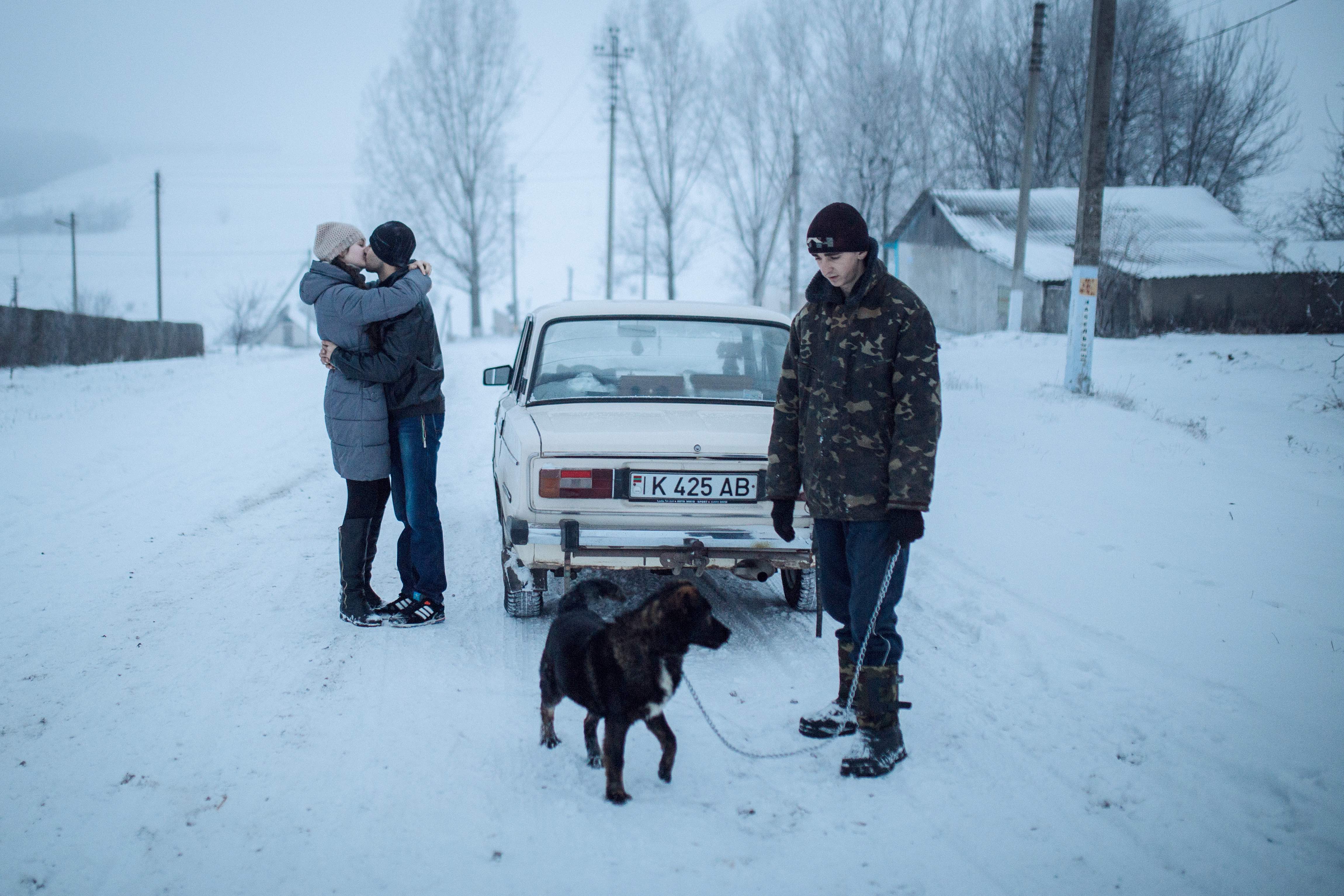 Yura embraces Tania in Rotar, where he visits her on weekends. In the countryside, boys often outnumber girls – most of whom either marry early or leave to start a new life in the city.