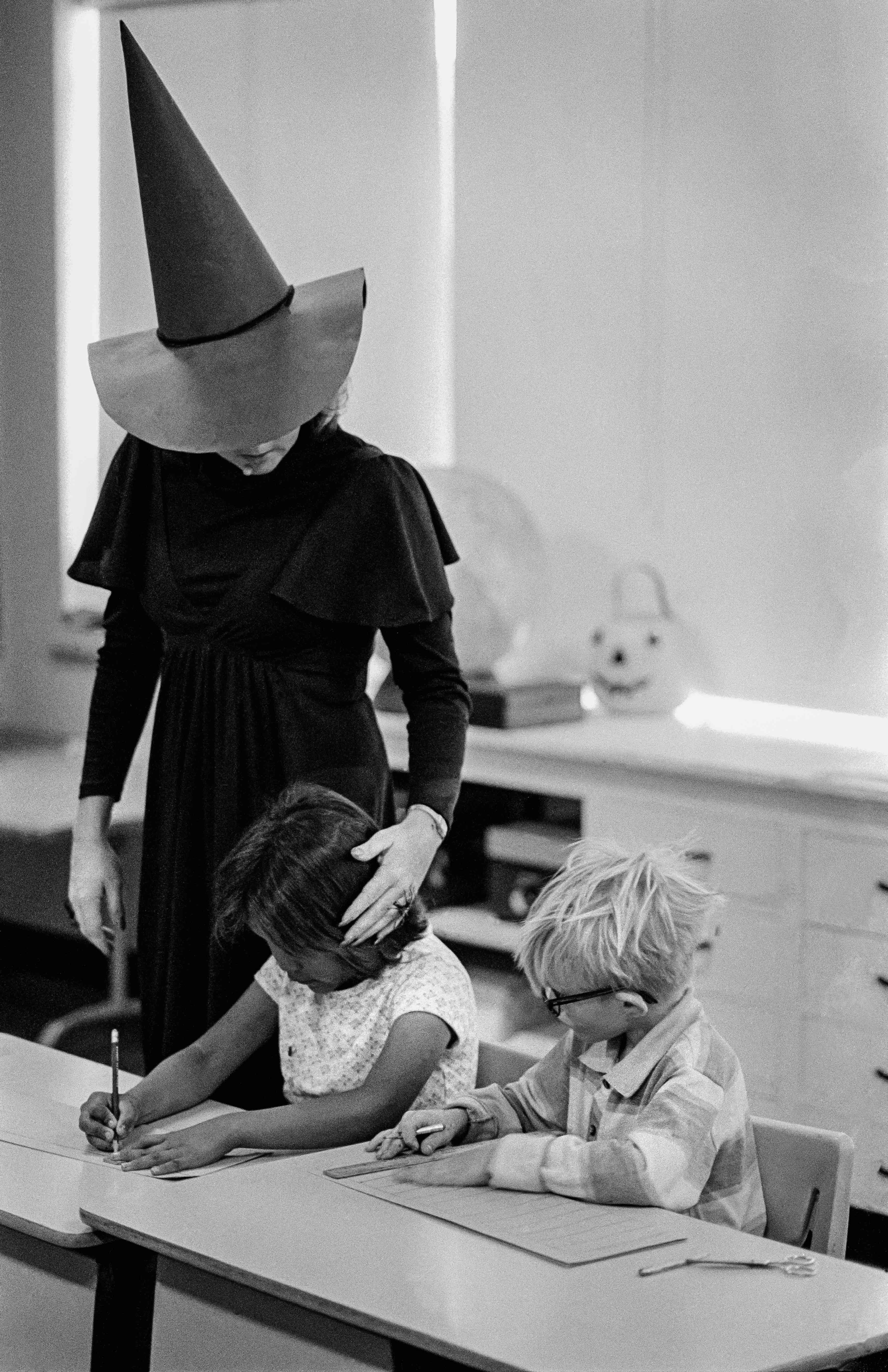 Kennilworth Elementary school in Phoenix where the students get into the spirit of Halloween celebrations with the help of a dressed up teacher. 1979.