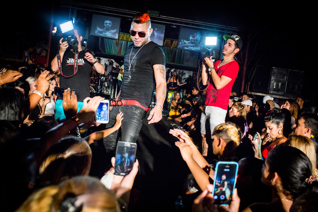 Concertgoers open Chacal's belt at Cabaret Guanimar.