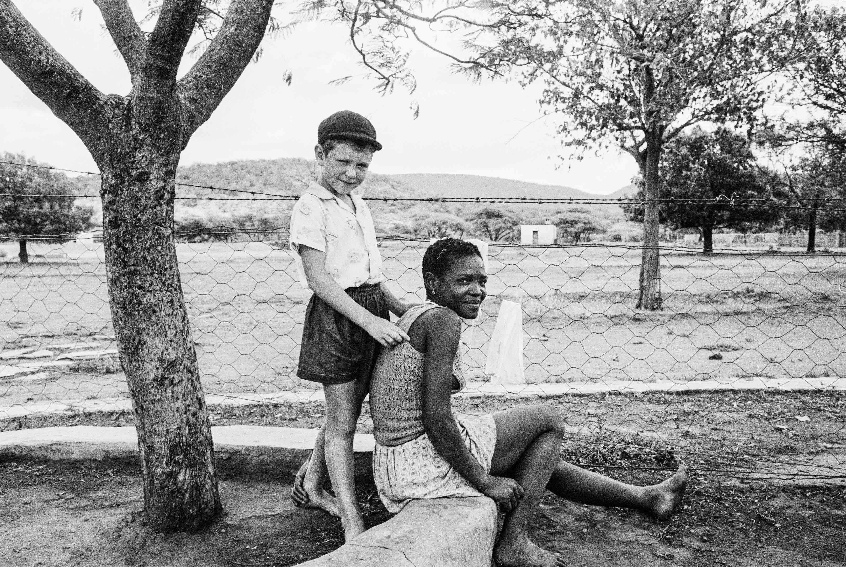 Some Afrikaners: A farmer's son with his nursemaid, Heimweeberg, Nietverdiend, Western Transvaal.
