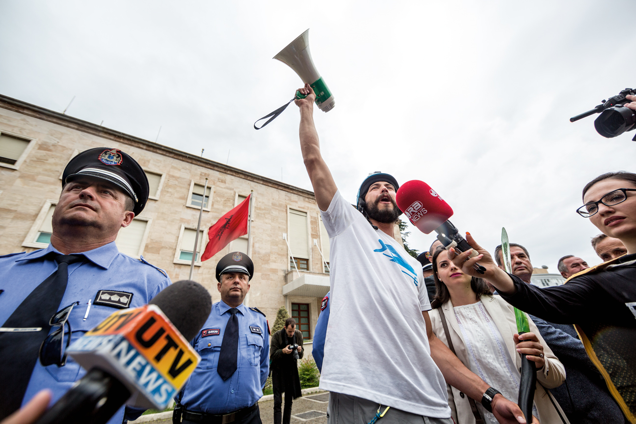 Rok Rozman, a Slovenian Olympic rower and now pro kayaker, protests the onslaught of hydropower dams throughout the Balkans in Tirana, Albania.