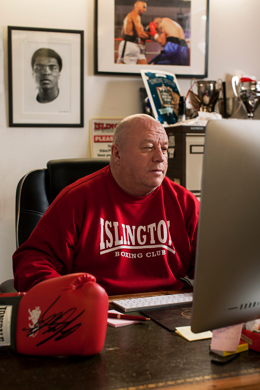 Lenny, sitting in his office.