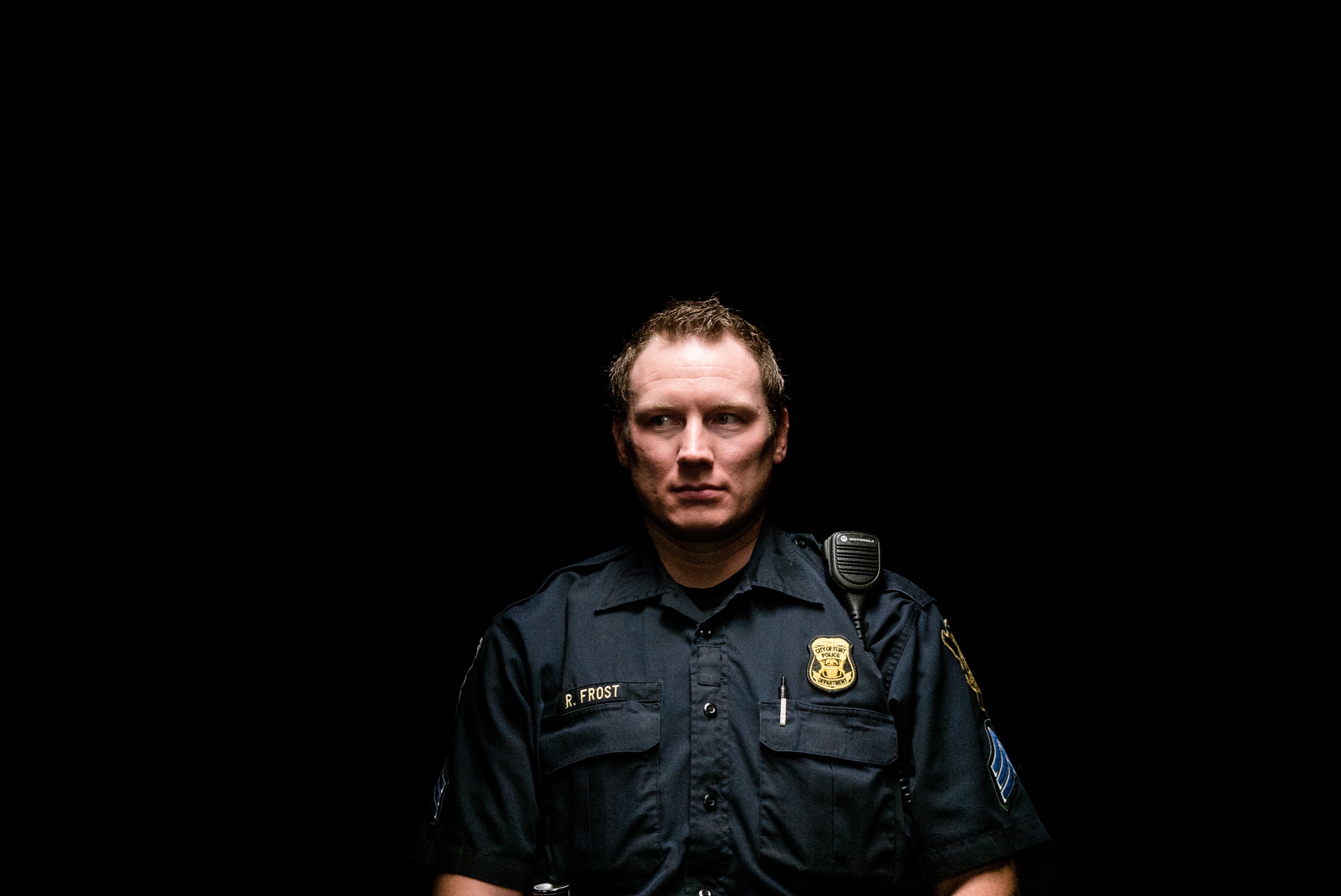 Sergeant Robert Frost has been working in Flint for over 12 years and has been fired and then rehired three times do to cutbacks.